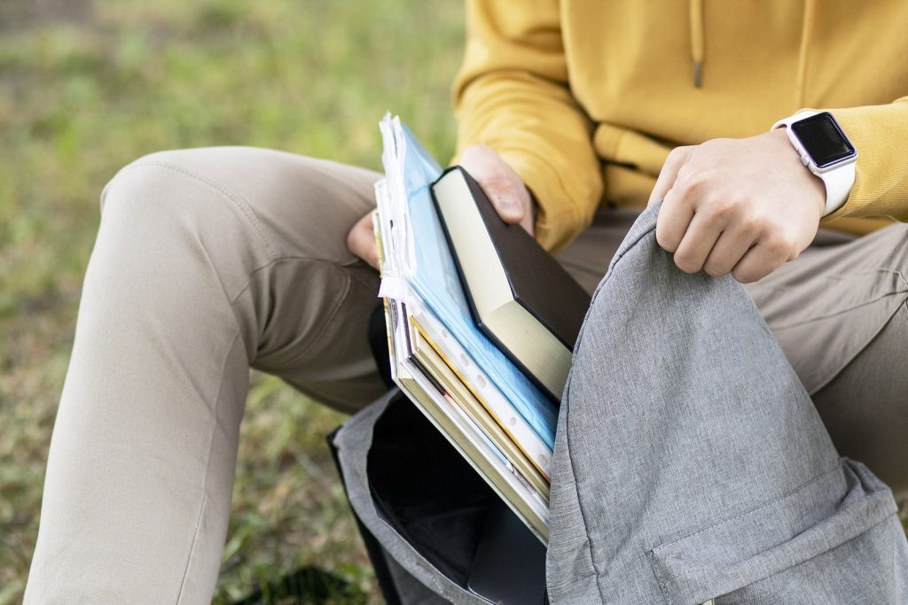 nest student housing book bag